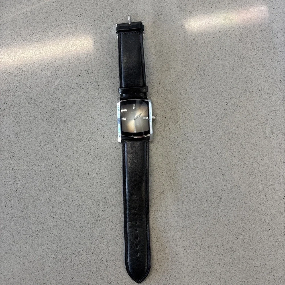 Armitron Men's Genuine Crystal Accented Leather Strap Watch 20/4604BKGPBK‎